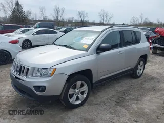2012 Jeep Compass Sport with VIN 1C4NJDBB4CD624163, listed as a IAAI auction lot 42025783 with 148,928 mi miles. Bid and sale history available at carsss.com. Image 17.