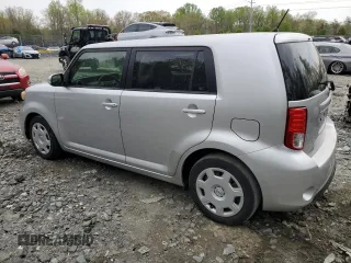 2014 Scion xB with VIN JTLZE4FE0EJ049899, listed as a Copart auction lot 52962125 with 120,791 mi miles and Salvage Title. Bid and sale history available at carsss.com. Image 2.