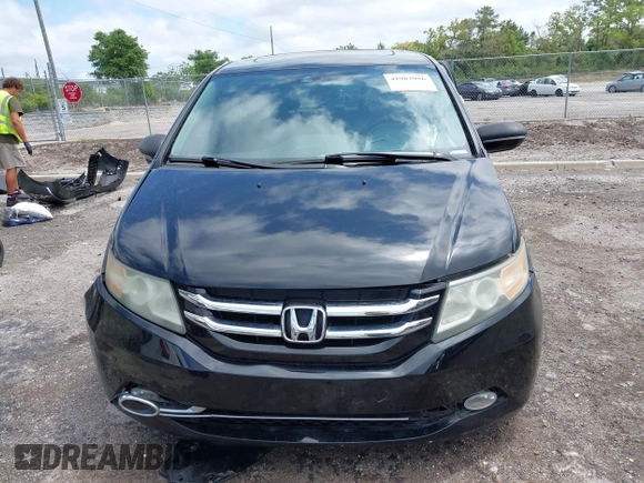 2014 Honda Odyssey Touring with VIN 5FNRL5H94EB057499, listed as a IAAI auction lot 41983956 with 158,573 mi miles and . Bid and sale history available at DreamBid. Image 12.
