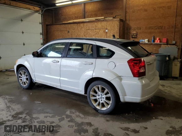2011 Dodge Caliber Heat z VIN 1B3CB5HA6BD222153, wystawiony jako Copart lot #56881205 z przebiegiem 153 950 mil mil oraz Szkody całkowita. Historia ofert i sprzedaży dostępna na DreamBid. Obrazek 2.