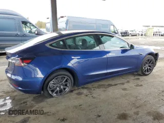 2020 Tesla Model 3 Standard Range Plus with VIN 5YJ3E1EA1LF631139, listed as a Copart auction lot 49161805 with 58,140 mi miles and Salvage Title. Bid and sale history available at DreamBid. Image 3.