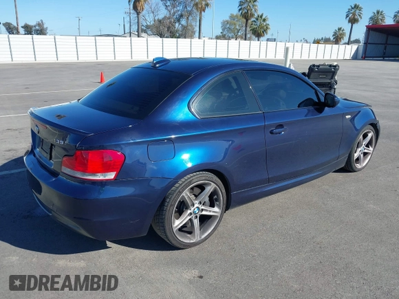 2010 BMW 1 Series 135i with VIN WBAUC7C58AVK96377, listed as a IAAI auction lot 41666512 with 136,890 mi miles and . Bid and sale history available at carsss.com. Image 4.