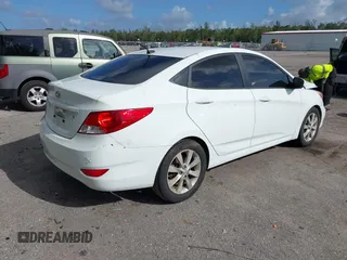 2014 Hyundai Accent GLS with VIN KMHCU4AE8EU608539, listed as a IAAI auction lot 41946784 with 106,709 mi miles and . Bid and sale history available at carsss.com. Image 4.