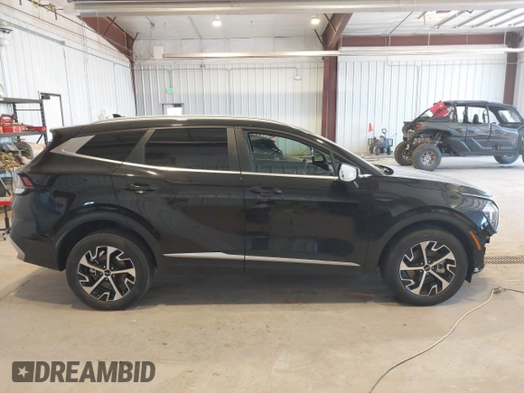 2023 Kia Sportage EX with VIN KNDPVCAG8P7095454, listed as a IAAI auction lot 42335661 with 96,718 mi miles and . Bid and sale history available at DreamBid. Image 14.