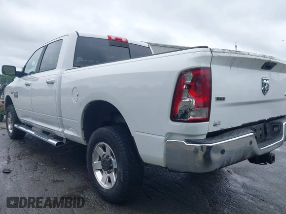 2013 Ram 2500 SLT z VIN 3C6TR5DT7DG524758, wystawiony jako IAAI lot #42333873 z przebiegiem Nie podano mil oraz . Historia ofert i sprzedaży dostępna na DreamBid. Obrazek 3.