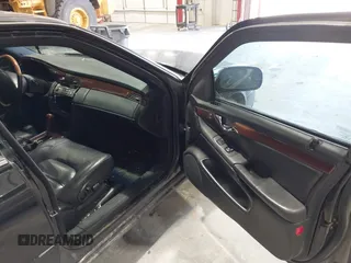 2002 Cadillac DeVille DTS with VIN 1G6KF579X2U141648, listed as a IAAI auction lot 42059624 with 179,338 mi miles. Bid and sale history available at carsss.com. Image 5.