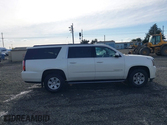 2015 GMC Yukon XL SLT with VIN 1GKS2HKC3FR586338, listed as a IAAI auction lot 41632662 with 149,133 mi miles. Bid and sale history available at carsss.com. Image 13.