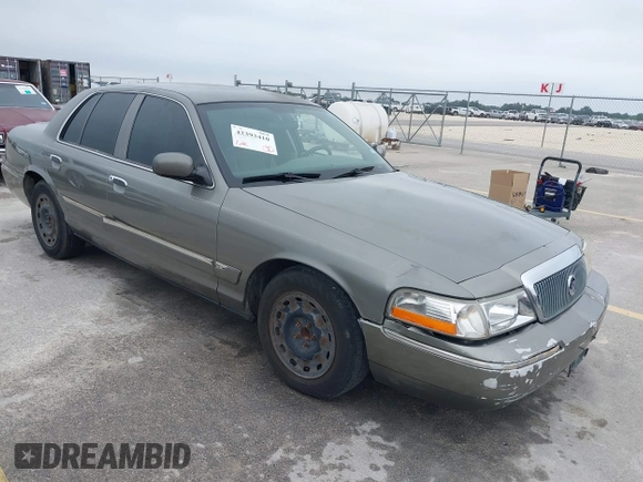 2003 Mercury Grand Marquis GS Convenience z VIN 2MEFM74W83X678151, wystawiony jako IAAI lot #42393410 z przebiegiem 273 966 mil mil oraz . Historia ofert i sprzedaży dostępna na DreamBid. Obrazek 1.