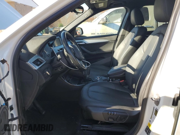 2016 BMW X1 xDrive28i with VIN WBXHT3C32G5E52052, listed as a Copart auction lot 79522024 with 76,995 mi miles and Salvage Title. Bid and sale history available at carsss.com. Image 7.