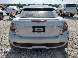 2013 MINI Coupe S z VIN WMWSX3C5XDT466209, wystawiony jako Copart lot #67072444 z przebiegiem 145 900 mil mil oraz Szkody całkowita. Historia ofert i sprzedaży dostępna na DreamBid. Obrazek 6.