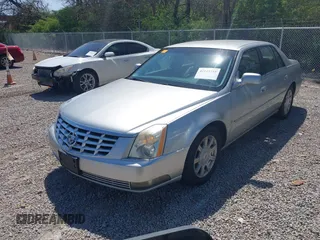 2008 Cadillac DTS 1SC with VIN 1G6KD57Y58U138842, listed as a IAAI auction lot 42113391 with 95,538 mi miles and . Bid and sale history available at carsss.com. Image 2.
