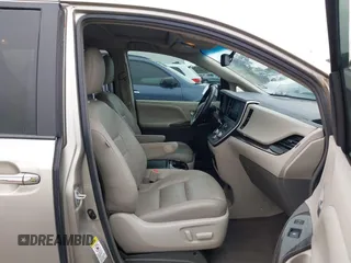 2015 Toyota Sienna XLE with VIN 5TDYK3DCXFS578888, listed as a IAAI auction lot 42187384 with 105,287 mi miles and . Bid and sale history available at DreamBid. Image 5.