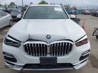 2021 BMW X5 xDrive40i with VIN 5UXCR6C03M9G36156, listed as a IAAI auction lot 42125009 with 30,877 mi miles. Bid and sale history available at carsss.com. Image 12.