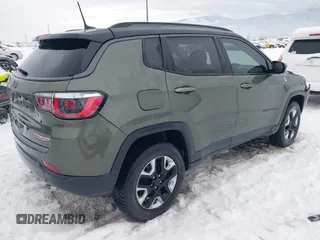 2018 Jeep Compass Trailhawk with VIN 3C4NJDDB5JT190890, listed as a IAAI auction lot 41251405 with 35,320 mi miles and . Bid and sale history available at carsss.com. Image 4.