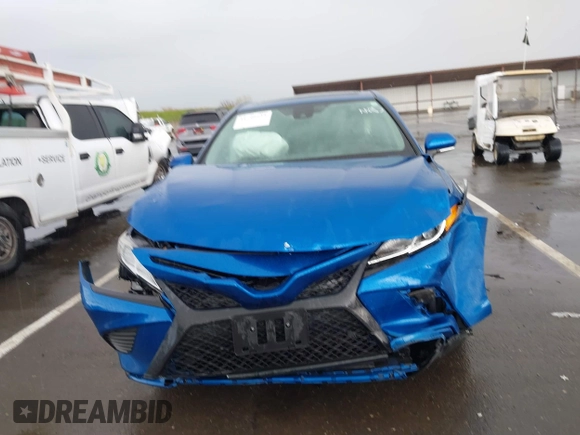 2019 Toyota Camry LE z VIN 4T1B11HK1KU282870, wystawiony jako IAAI lot #41799625 z przebiegiem 63 977 mil mil oraz . Historia ofert i sprzedaży dostępna na DreamBid. Obrazek 12.
