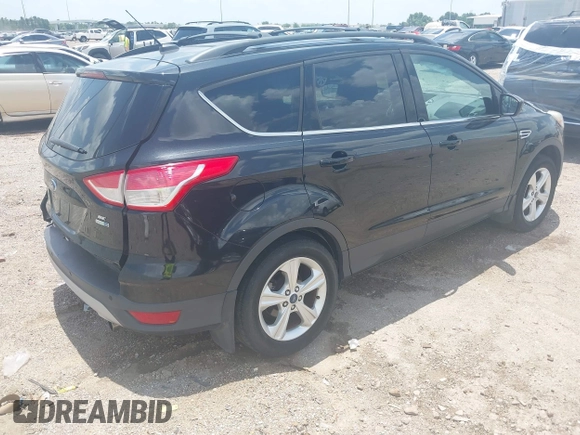 2013 Ford Escape SE with VIN 1FMCU9GX0DUC42483, listed as a IAAI auction lot 42549857 with 138,028 mi miles and . Bid and sale history available at DreamBid. Image 4.