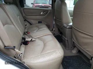 2001 Mazda Tribute LX with VIN 4F2CU08101KM11452, listed as a Copart auction lot 76796064 with 175,584 mi miles and Salvage Title. Bid and sale history available at DreamBid. Image 11.