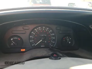 1997 Ford Contour с VIN 3FALP6535VM112253, выставлен на аукционе Copart как лот 80501924 с пробегом 116 778 миль миль и Списание • Salvage title. История ставок и продаж доступна на DreamBid. Изображение 9.