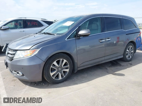 2014 Honda Odyssey Touring with VIN 5FNRL5H91EB093540, listed as a IAAI auction lot 41887412 with 202,076 mi miles and . Bid and sale history available at DreamBid. Image 22.