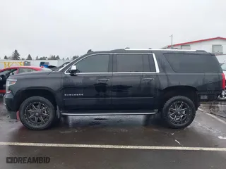 2017 Chevrolet Suburban Premier with VIN 1GNSKJKC4HR162261, listed as a IAAI auction lot 41593672 with 100,136 mi miles. Bid and sale history available at carsss.com. Image 15.