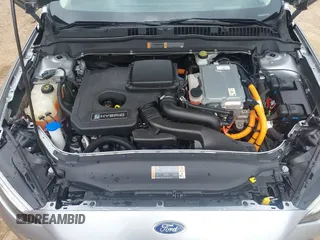 2020 Ford Fusion SE z VIN 3FA6P0LU4LR148070, wystawiony jako IAAI lot #42262446 z przebiegiem 69 057 mil mil oraz . Historia ofert i sprzedaży dostępna na DreamBid. Obrazek 10.
