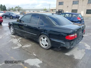 2000 Mercedes-Benz E-Class with VIN WDBJF65JXYA997410, listed as a IAAI auction lot 41939485 with 158,559 mi miles. Bid and sale history available at carsss.com. Image 3.