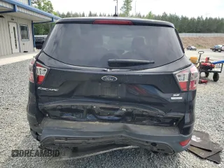 2017 Ford Escape SE z VIN 1FMCU0GD7HUA94744, wystawiony jako Copart lot #54209545 z przebiegiem 99 658 mil mil oraz Szkoda całkowita • Salvage title. Historia ofert i sprzedaży dostępna na DreamBid. Obrazek 6.