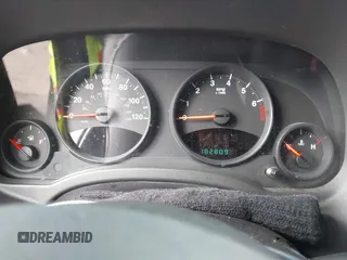 2011 Jeep Patriot Latitude with VIN 1J4NT1GB5BD140710, listed as a IAAI auction lot 41499486 with 182,809 mi miles. Bid and sale history available at carsss.com. Image 7.