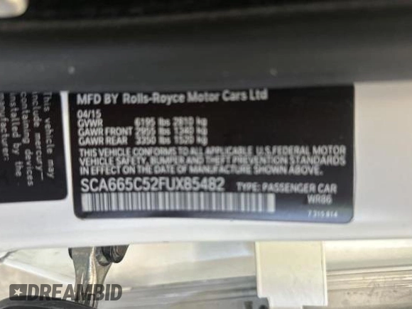 2015 Rolls-Royce Wraith z VIN SCA665C52FUX85482, wystawiony jako Copart lot #77887554 z przebiegiem 99 781 mil mil oraz Szkody całkowita. Historia ofert i sprzedaży dostępna na DreamBid. Obrazek 10.