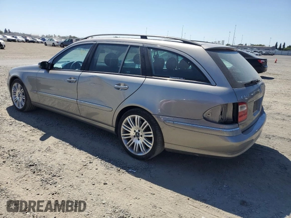 2005 Mercedes-Benz E 500 with VIN WDBUH83J35X168838, listed as a Copart auction lot 69885014 with 203,187 mi miles and Salvage Title. Bid and sale history available at carsss.com. Image 2.