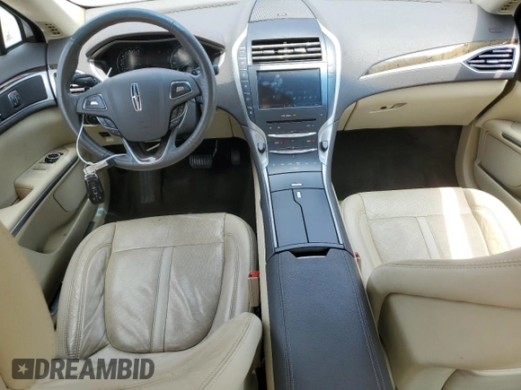 2014 Lincoln MKZ z VIN 3LN6L2GK4ER825465, wystawiony jako Copart lot #55911345 z przebiegiem 78 783 mil mil oraz Szkoda całkowita • Salvage title. Historia ofert i sprzedaży dostępna na DreamBid. Obrazek 8.