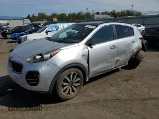 2018 Kia Sportage EX z VIN KNDPNCAC7J7362913, wystawiony jako Copart lot #54386815 z przebiegiem 41 686 mil mil oraz Szkody całkowita. Historia ofert i sprzedaży dostępna na DreamBid. Obrazek 1.