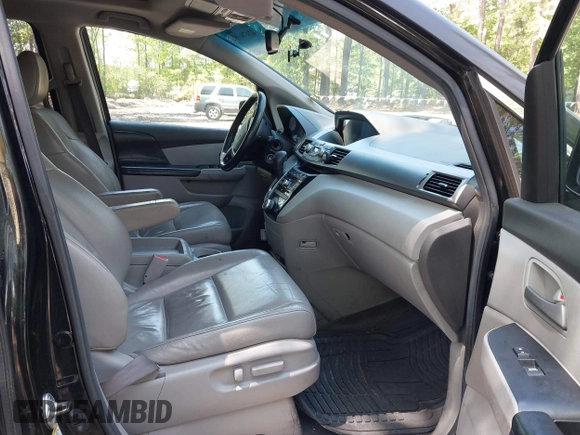 2013 Honda Odyssey EX-L with VIN 5FNRL5H69DB025040, listed as a IAAI auction lot 42078699 with 181,470 mi miles and . Bid and sale history available at carsss.com. Image 5.