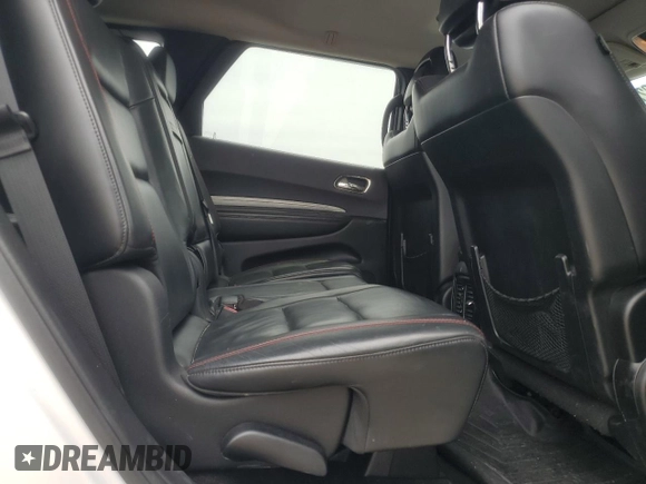 2018 Dodge Durango с VIN NY76958, выставлен на аукционе Copart как лот 55122245 с пробегом 102 413 миль миль и Списание • Salvage title. История ставок и продаж доступна на DreamBid. Изображение 11.
