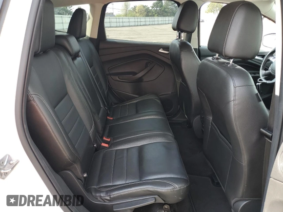 2015 Ford Escape Titanium with VIN 1FMCU0J99FUA16290, listed as a Copart auction lot 52496855 with 107,674 mi miles and Salvage Title. Bid and sale history available at DreamBid. Image 11.