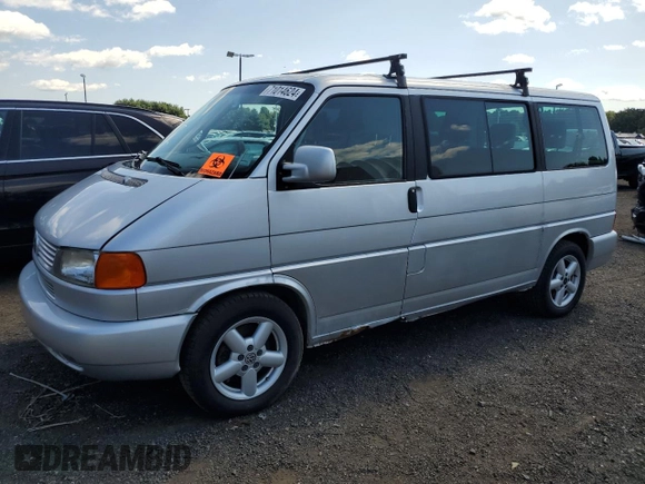 2003 Volkswagen EuroVan MV с VIN WV2MB47023H044047, выставлен на аукционе Copart как лот 71014624 с пробегом 189 485 миль миль и Чистый • Clean title. История ставок и продаж доступна на DreamBid. Изображение 1.