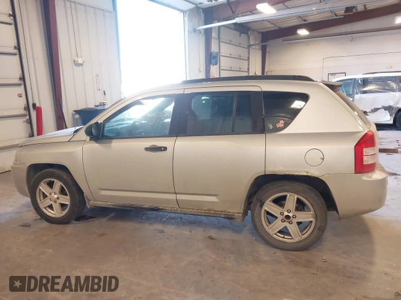 2007 Jeep Compass Sport with VIN 1J8FF47W57D598222, listed as a IAAI auction lot 41379480 with 181,919 mi miles. Bid and sale history available at carsss.com. Image 14.
