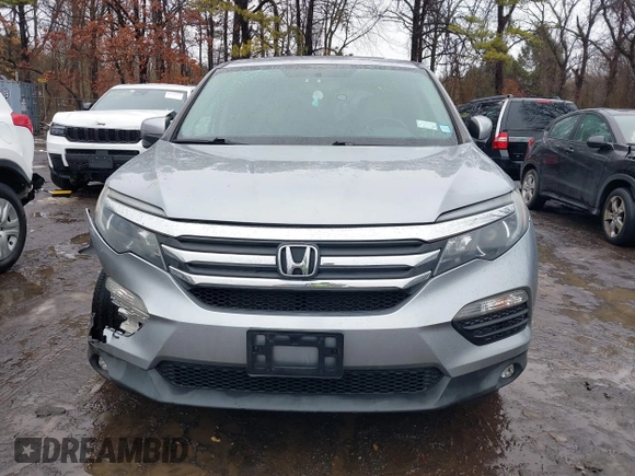 2017 Honda Pilot EX-L with VIN 5FNYF6H51HB069068, listed as a IAAI auction lot 41567728 with 100,618 mi miles and . Bid and sale history available at DreamBid. Image 12.