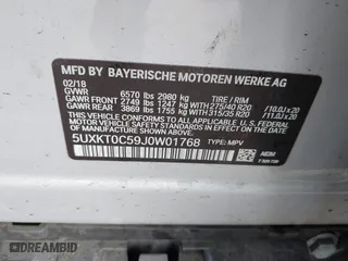 2018 BMW X5 xDrive40e iPerformance with VIN 5UXKT0C59J0W01768, listed as a IAAI auction lot 41603257 with 1 mi miles. Bid and sale history available at carsss.com. Image 9.