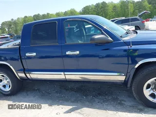 2005 Dodge Dakota SLT with VIN 1D7HW48N05S113487, listed as a IAAI auction lot 42029813 with 229,025 mi miles. Bid and sale history available at carsss.com. Image 14.