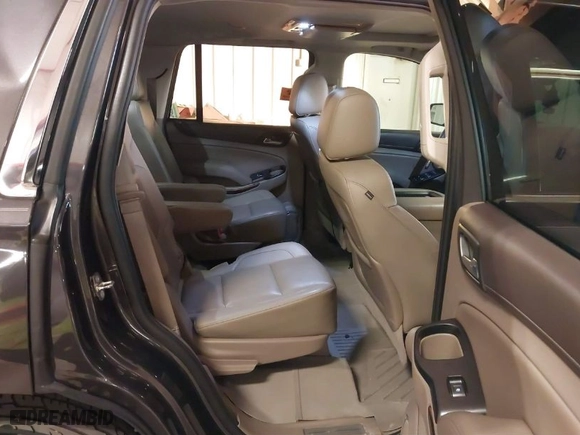 2016 GMC Yukon SLT with VIN 1GKS2BKC8GR277799, listed as a IAAI auction lot 41400549 with 91,139 mi miles. Bid and sale history available at carsss.com. Image 8.