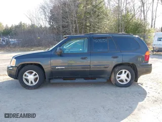 2005 GMC Envoy SLE with VIN 1GKDT13S852116252, listed as a IAAI auction lot 42086929 with 1 mi miles. Bid and sale history available at carsss.com. Image 12.