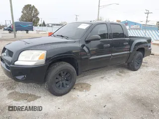 2008 Mitsubishi Raider LS with VIN 1Z7HT28K38S588511, listed as a IAAI auction lot 40750993 with 196,501 mi miles. Bid and sale history available at carsss.com. Image 2.