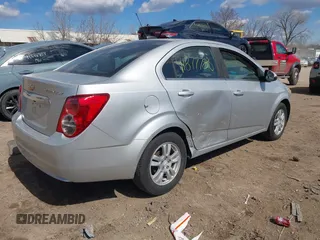 2015 Chevrolet Sonic LT with VIN 1G1JC5SH5F4212883, listed as a IAAI auction lot 41877786 with 91,941 mi miles and . Bid and sale history available at DreamBid. Image 4.