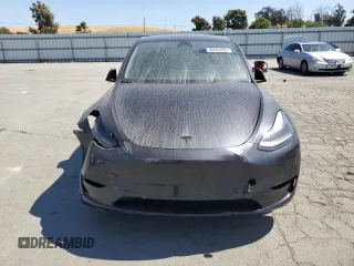 2024 Tesla Model Y z VIN 7SAYGDED7RF050963, wystawiony jako Copart lot #60683895 z przebiegiem 23 100 mil mil oraz Czysty tytuł • Clean title. Historia ofert i sprzedaży dostępna na DreamBid. Obrazek 5.