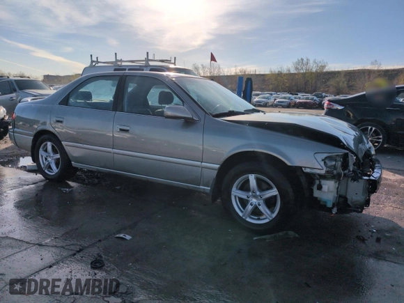 2001 Toyota Camry LE z VIN JT2BF22K810291438, wystawiony jako Copart lot #54261565 z przebiegiem 174 101 mil mil oraz Szkoda całkowita • Salvage title. Historia ofert i sprzedaży dostępna na DreamBid. Obrazek 4.
