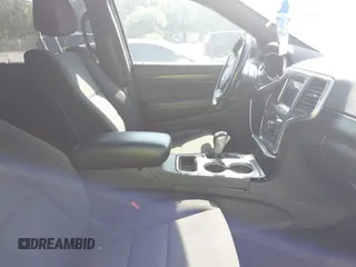 2020 Jeep Grand Cherokee Laredo E with VIN 1C4RJFAG1LC389026, listed as a IAAI auction lot 42261396 with 100,409 mi miles and . Bid and sale history available at DreamBid. Image 5.