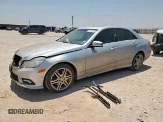 2011 Mercedes-Benz E 550 Luxury with VIN WDDHF9AB7BA302006, listed as a Copart auction lot 57443775 with 157,341 mi miles and Salvage title. Bid and sale history available at DreamBid. Image 1.