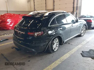 2016 Infiniti QX70 z VIN JN8CS1MW7GM400558, wystawiony jako IAAI lot #40917829 z przebiegiem 149 885 mil mil oraz . Historia ofert i sprzedaży dostępna na DreamBid. Obrazek 4.