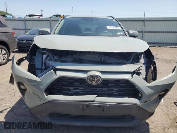 2020 Toyota RAV4 XLE with VIN 2T3P1RFV1LW096482, listed as a Copart auction lot 61797065 with 47,406 mi miles and Salvage title. Bid and sale history available at DreamBid. Image 5.
